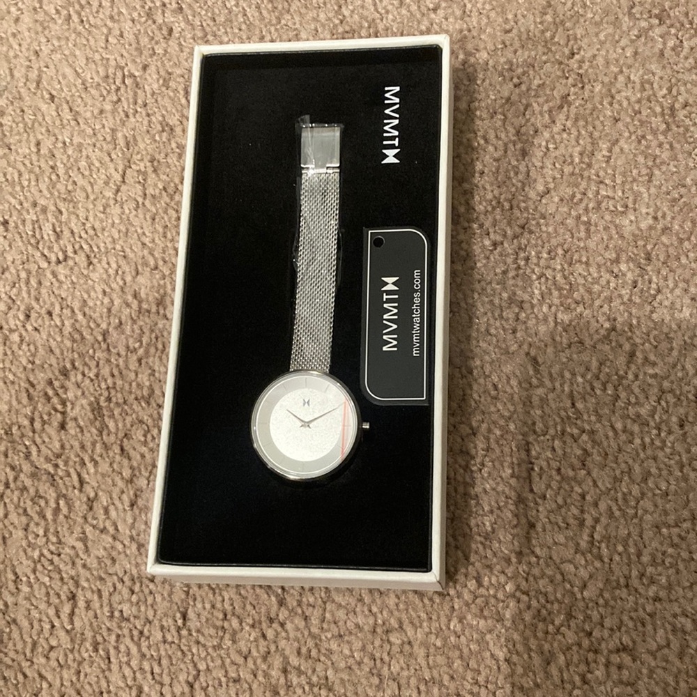 MVMT Women’s skinny silver watch with black leather straps